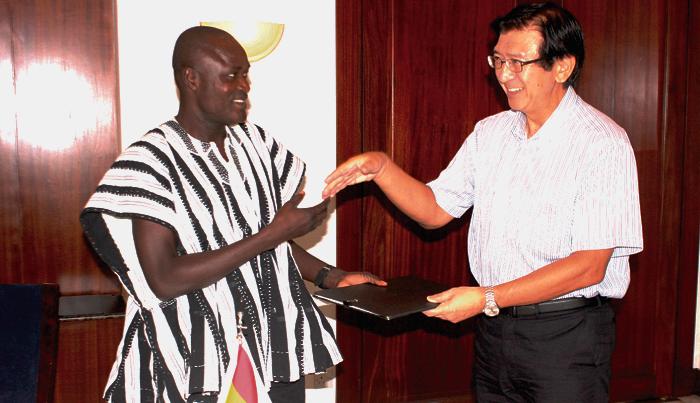  Mr Kaoru Yoshimura (right), Japanese Ambassador to Ghana, handing over the grant document to Mr Shei Fuseini (left), Director, Institute for Sustainable Democratic Development. Picture: NII MARTEY M. BOTCHWAY